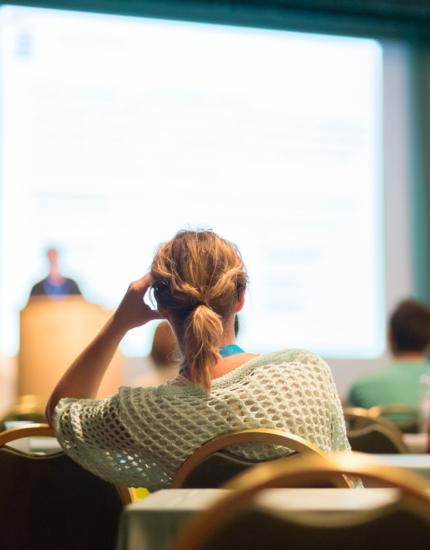 person sitting in a lecture